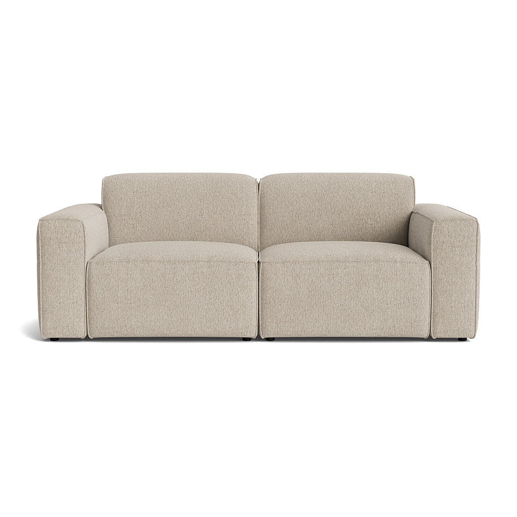 Element modulsofa i lys beige stof, perfekt til komfortabel og fleksibel indretning.